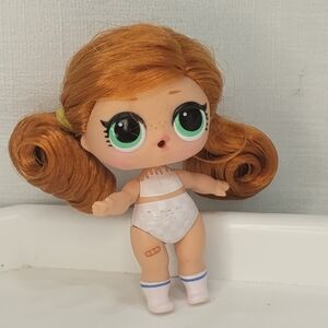 L.O.L. Surprise! Doll with Orange Hair and White Outfit
